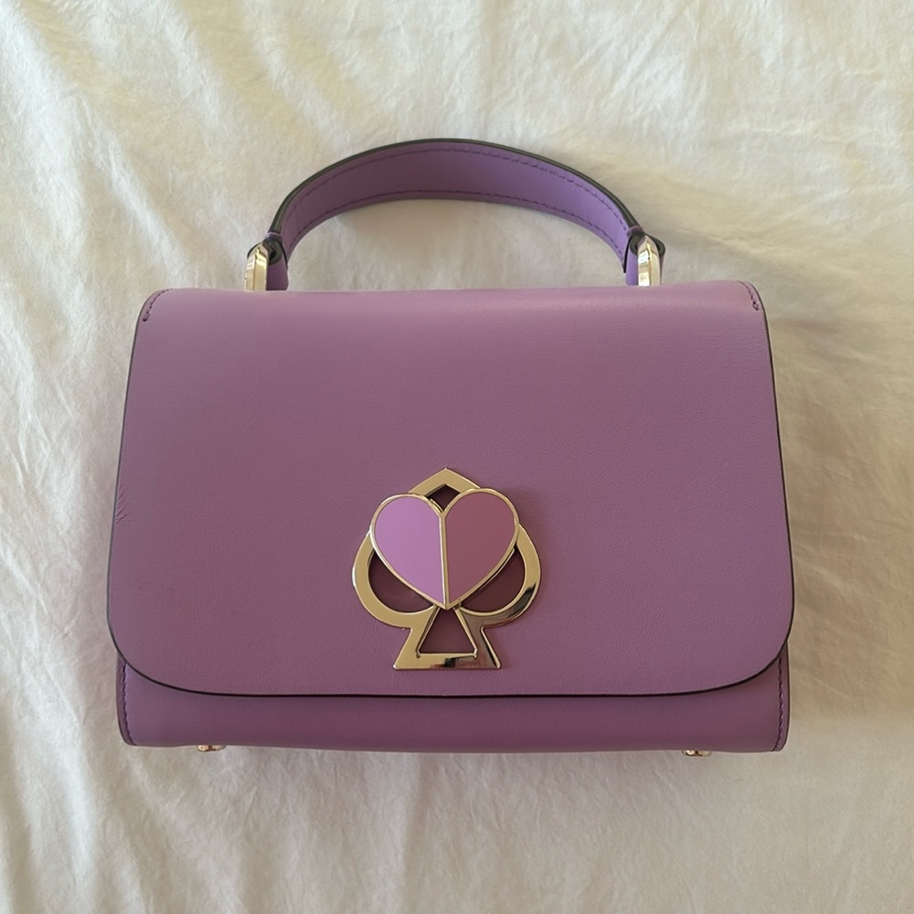 Kate Spade Nicola Twist Handbag with Small Top Handle in shade Irisbloom